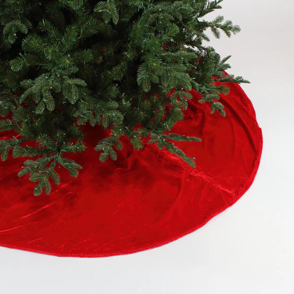 Red velvet tree skirt with soft folded drape.