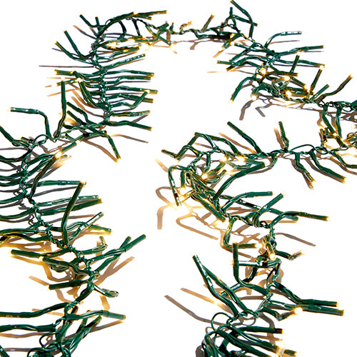 White cluster lights on green wire with a remote, draped as a garland.