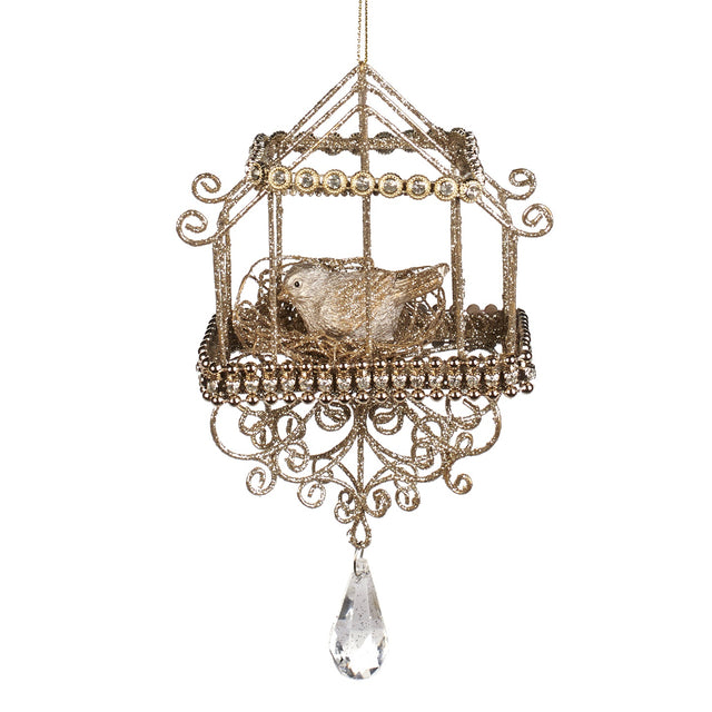 Gold jeweled bird in a cage ornament.