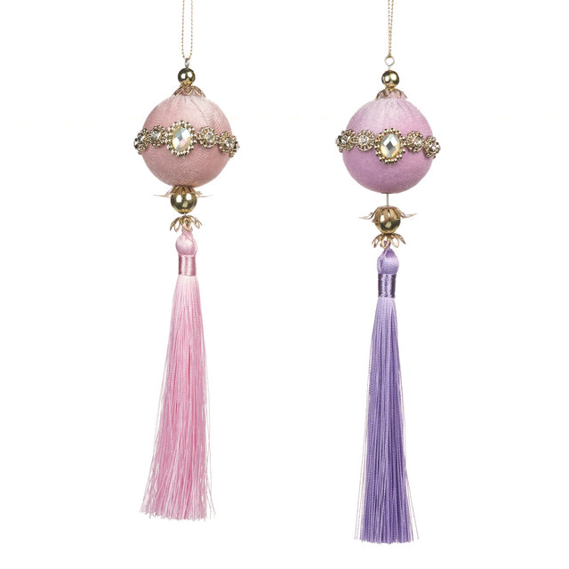 Pink and purple jeweled tassel ornament with beaded strands.