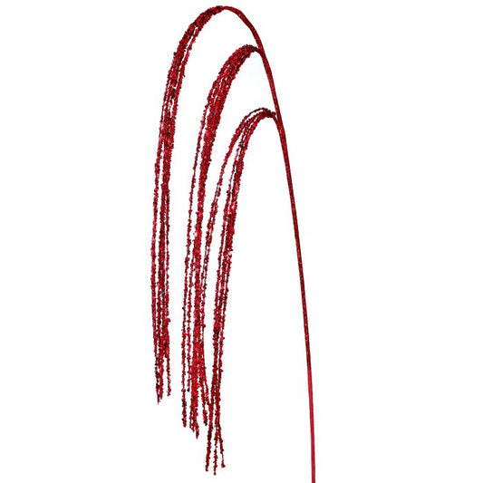 Red rain spray with fine falling strands.