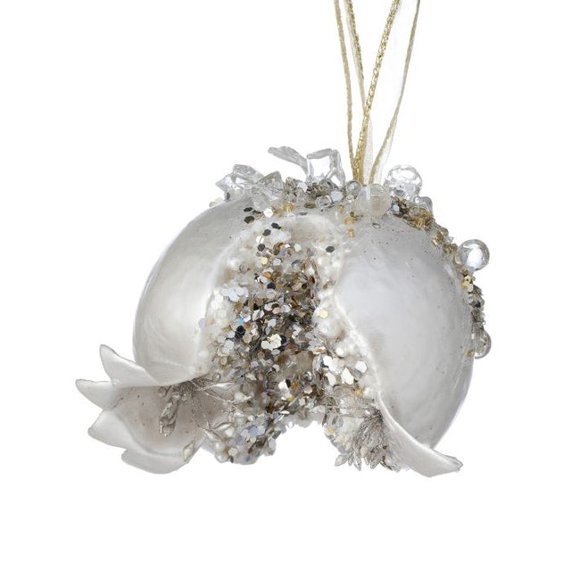 Ivory and gold jeweled pomegranate ornament with a faceted finish.