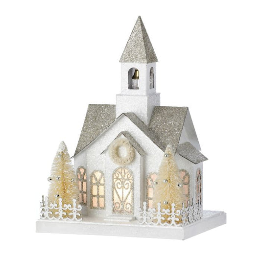 White snowy vintage LED house village piece.