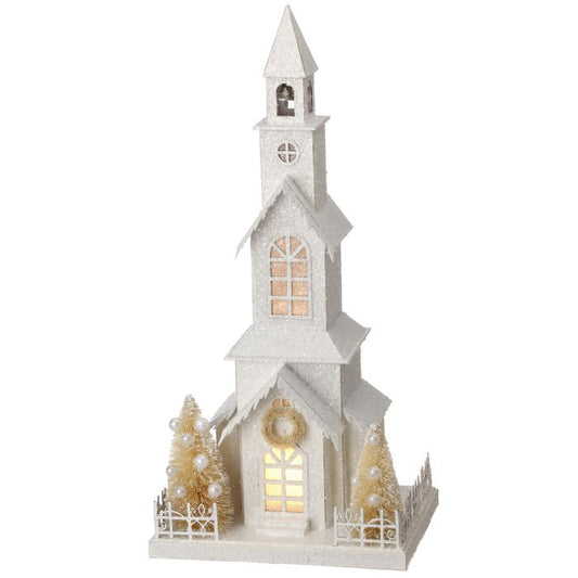 Snowy LED church with a lighted interior.