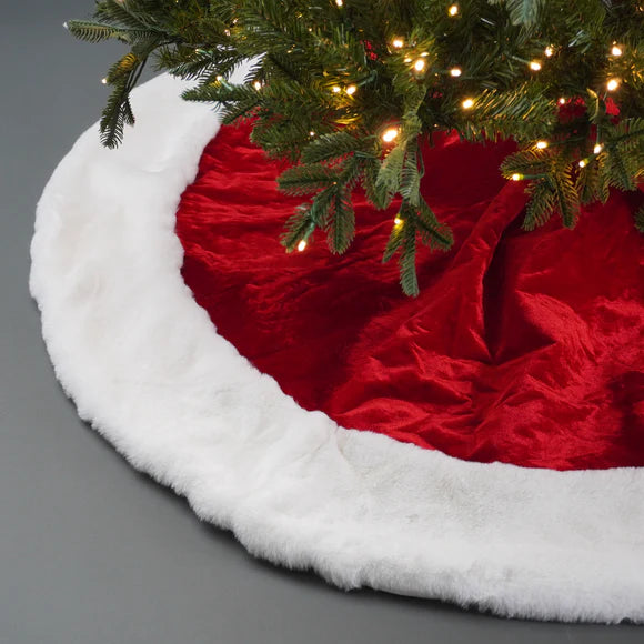 Red and white Santa tree skirt with a festive motif.