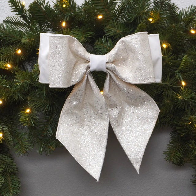 Pearl confetti glitter bow with sparkling loops.