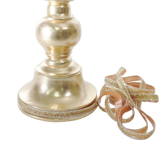 Gold baguette self-adhesive trim with jeweled detail.