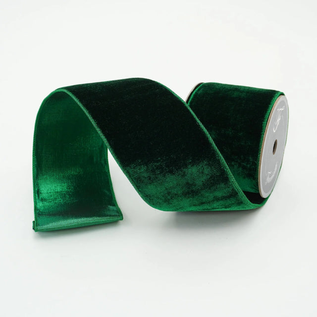 Emerald velvet ribbon with a metallic dupion back and a wired edge.