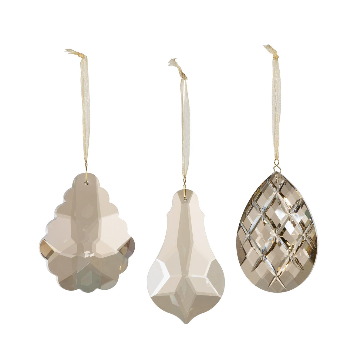 Champagne gem crystal ornament with faceted cuts.