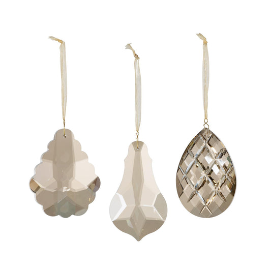 Champagne gem crystal ornament with faceted cuts.