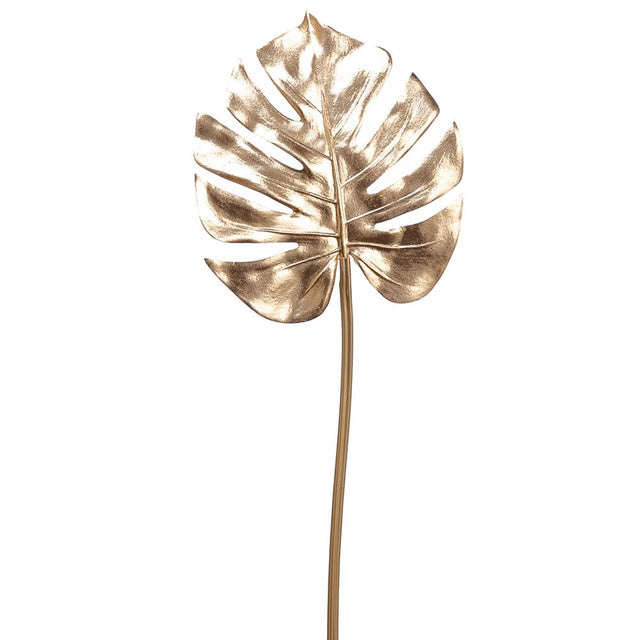 Gold metallic spray with layered metallic gold leaves.
