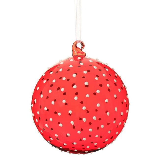 Red glass ball ornament with white polka dots.