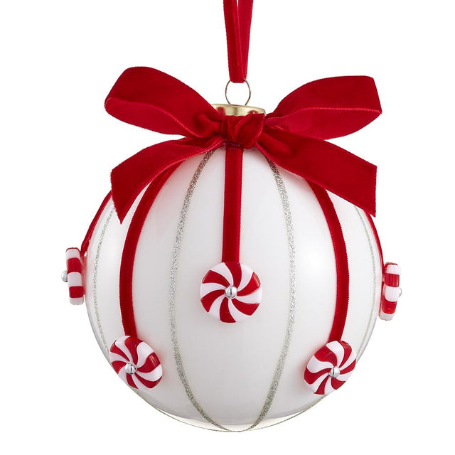 Candy white red glass ball ornament with a glossy finish.