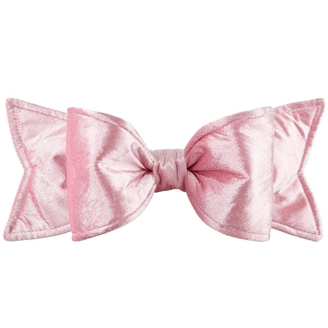Pink velvet bow with plush gathered loops.
