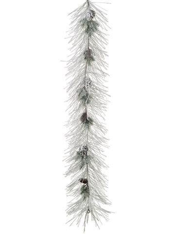 Green pine garland with snow flocking and full branches.