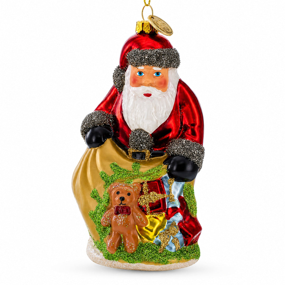 Red glass Santa ornament holding a gold sack with a teddy bear and gifts.
