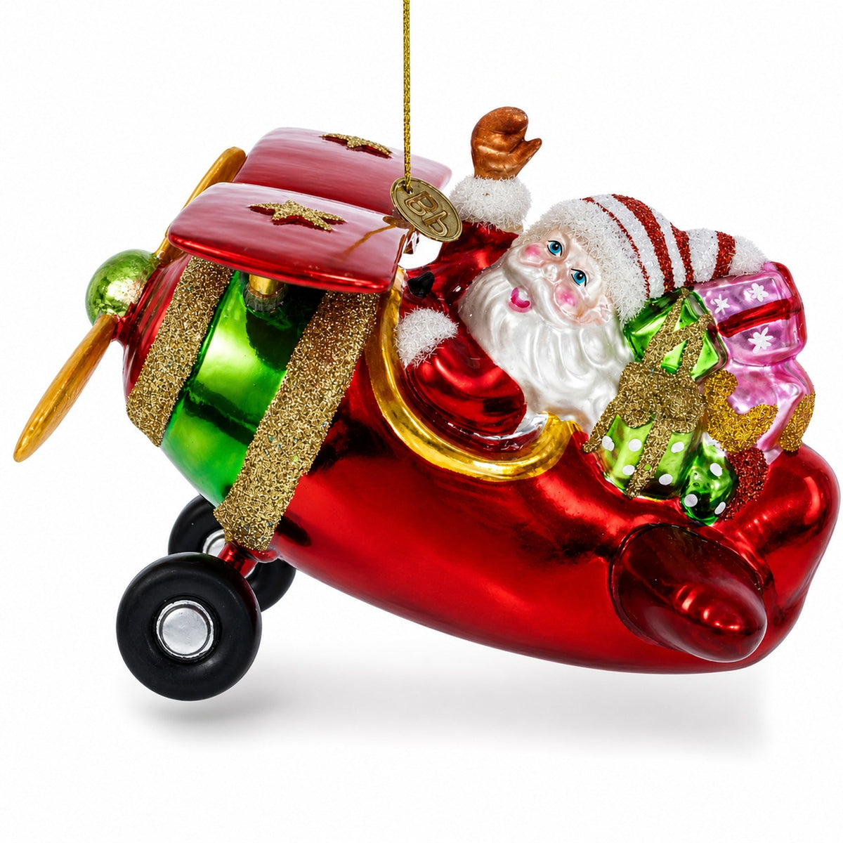 Red glass airplane ornament with Santa waving from the cockpit and gifts aboard.