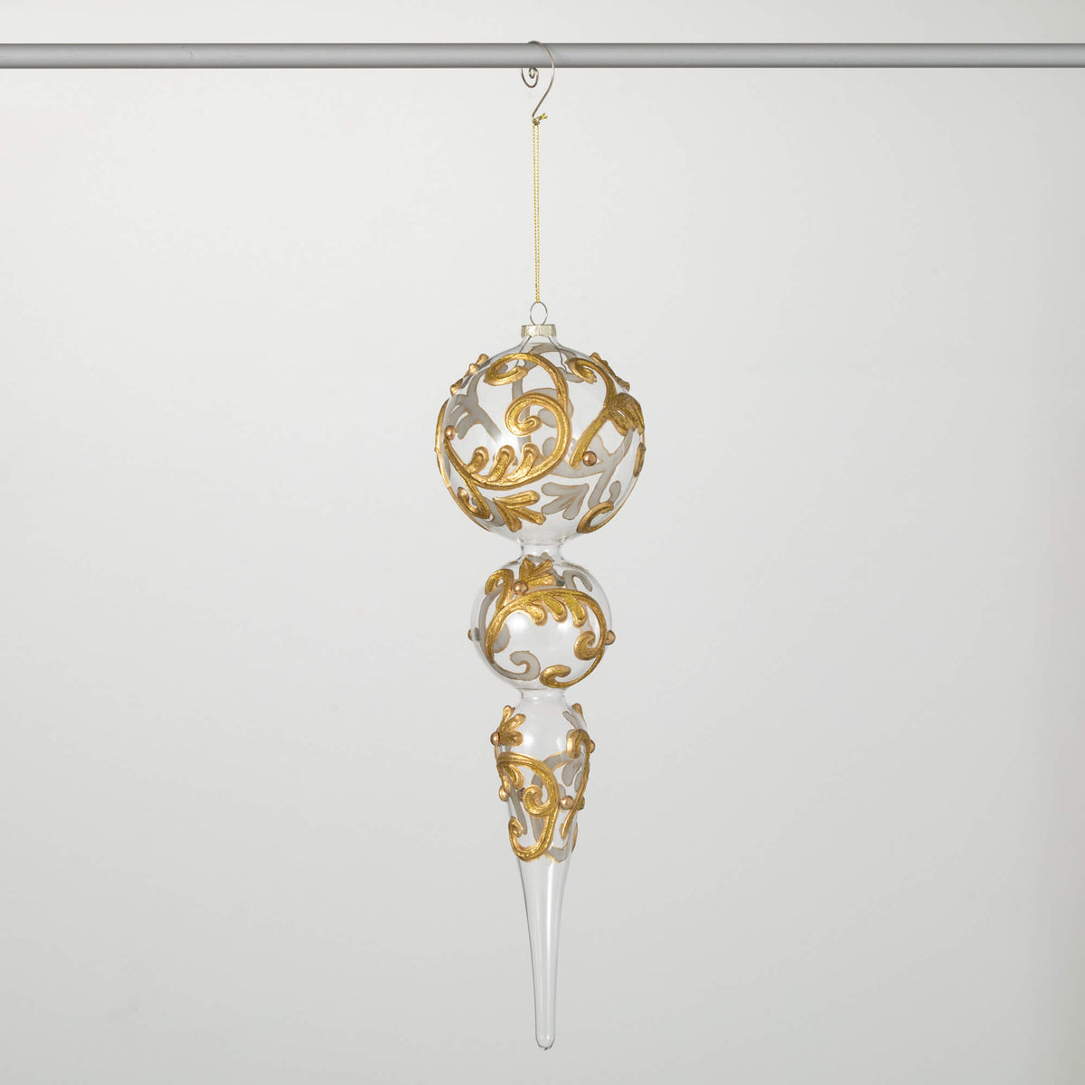 Gold encrusted finial ornament with jeweled detail.