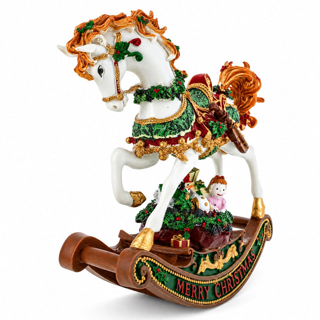 White rocking horse sculpture with a flowing copper mane, Christmas garland and a brown Merry Christmas rocker.
